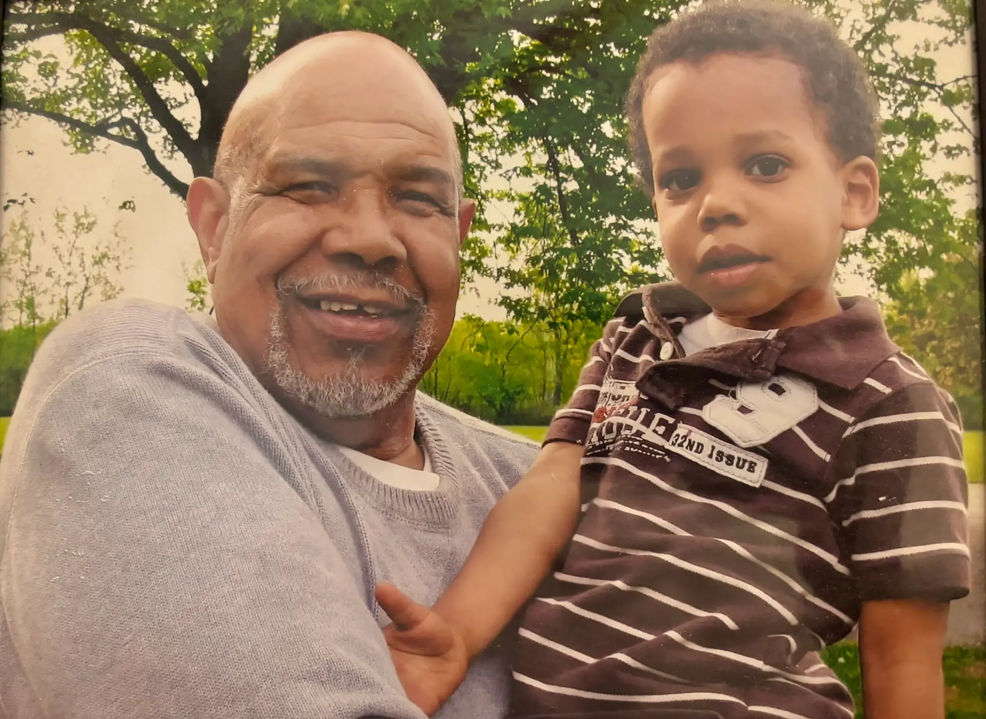 Michael Miller holding his grandson Nicholas