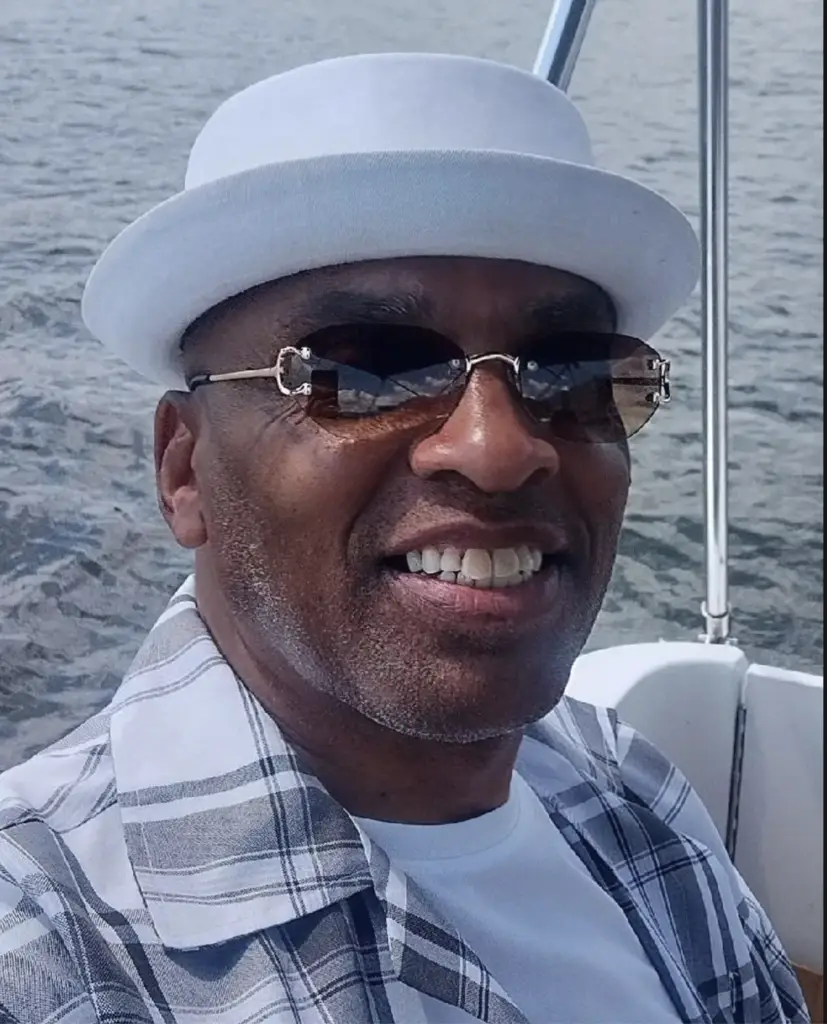 Donald Gardner, subject of Part Two of Unhoused and Unheard: The Black Experience of Homelessness on The Color Between the Lines podcast, photographed on a boat.