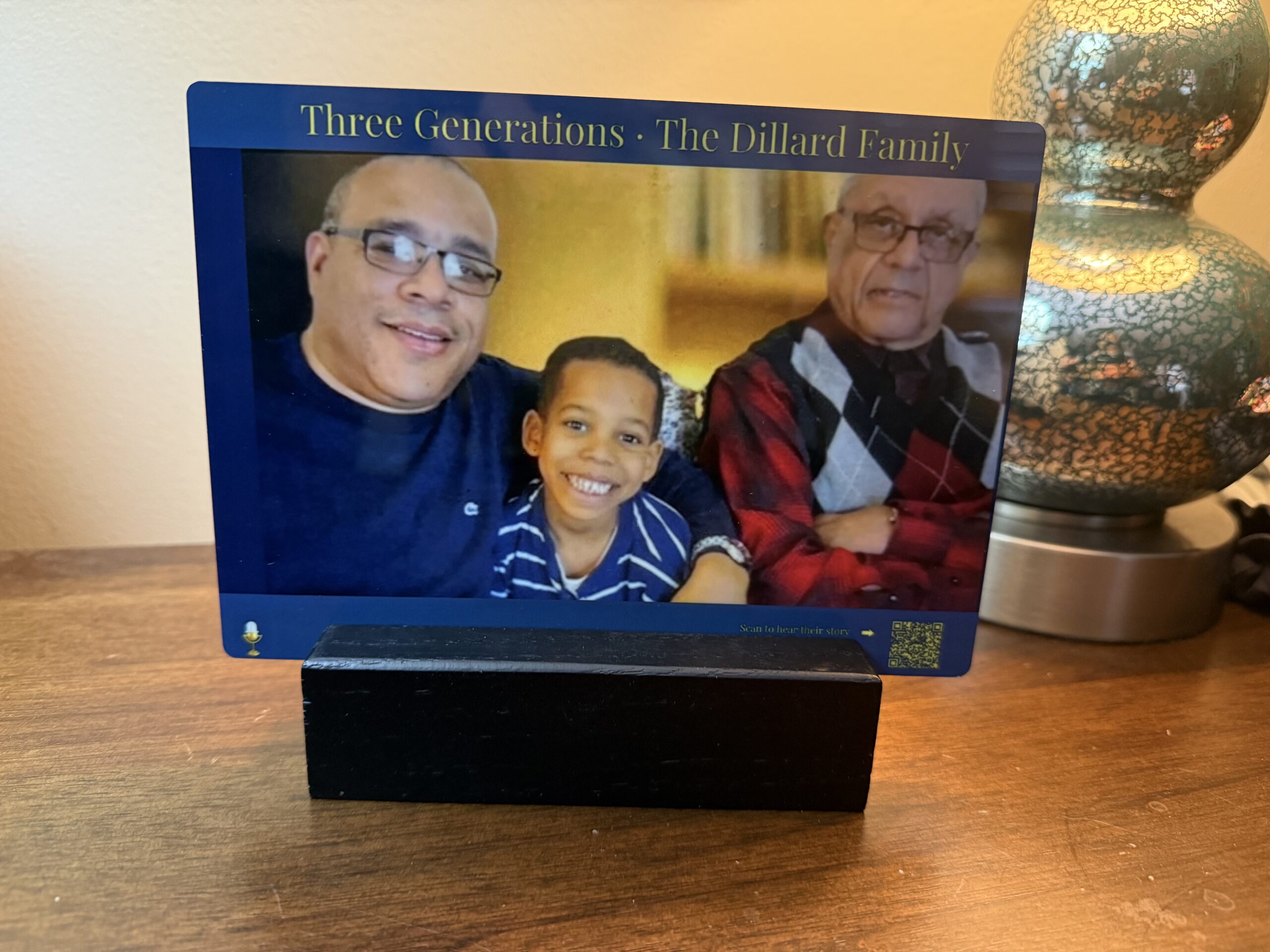 HeirSound Photo metal print on black stand three generations Dillard family audio QR code built in Canva